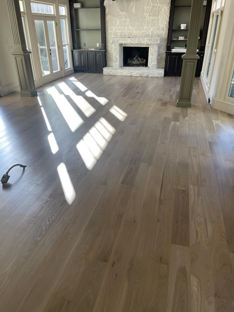 Light gray hardwood floor in living room